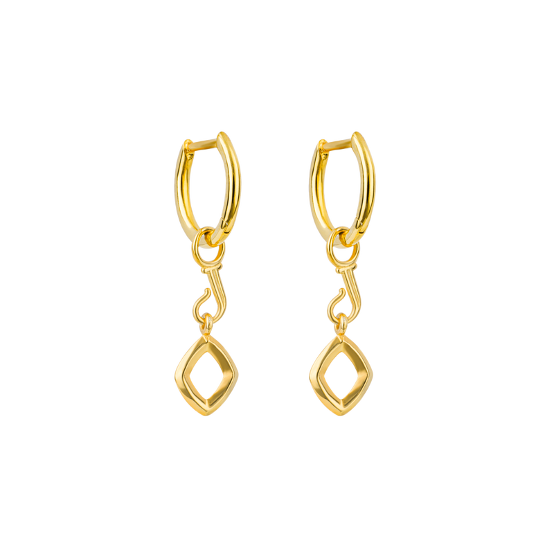 A front-view image of a pair of Juraster’s 9ct Gold Hoop Earrings, Anchor, attached to 9ct Gold Diamond-Shaped Earring Charms, Compass, crafted from Fairmined yellow gold.