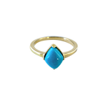 A front-view image of Juraster’s 9ct Gold Stacking Ring in Persian Blue Turquoise, Lodestone, crafted from Fairmined 9ct yellow gold and a hand-cut turquoise gemstone.