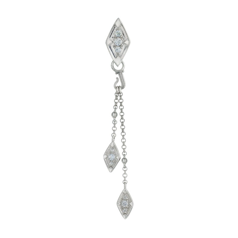 A flat-lay image of Juraster’s 9ct White Gold Diamond Tassel Pendant, Palace, crafted from Fairmined 9ct white gold and conflict-free diamonds.