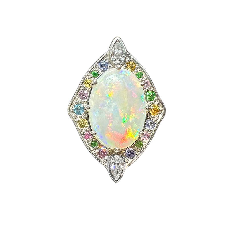 A front-view image of Juraster’s 14ct white gold transformable ring-pendant with opal, rainbow gemstones & diamonds, Selkie 2, crafted from Fairmined white gold, precious Australian opal, hand-cut gemstones and conflict-free diamonds.