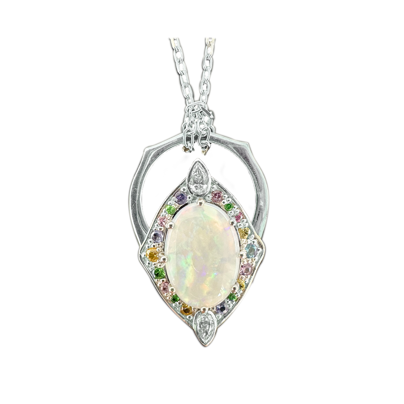 A front-view image of Juraster’s 14ct white gold transformable ring-pendant with opal, rainbow gemstones & diamonds, Selkie 2, crafted from Fairmined white gold, precious Australian opal, hand-cut gemstones and conflict-free diamonds, as a pendant on a necklace.