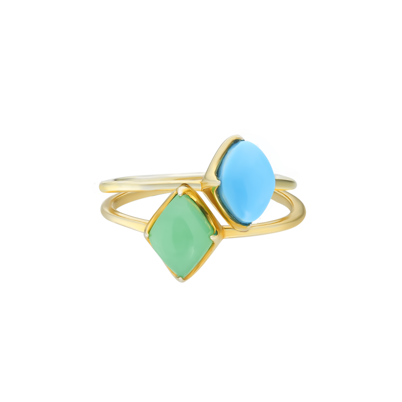 A front-view image of Juraster’s 9ct Gold Stacking Ring in Persian Blue Turquoise, Lodestone, crafted from Fairmined 9ct yellow gold and a hand-cut turquoise gemstone, stacked on top of a yellow gold chrysoprase ring.