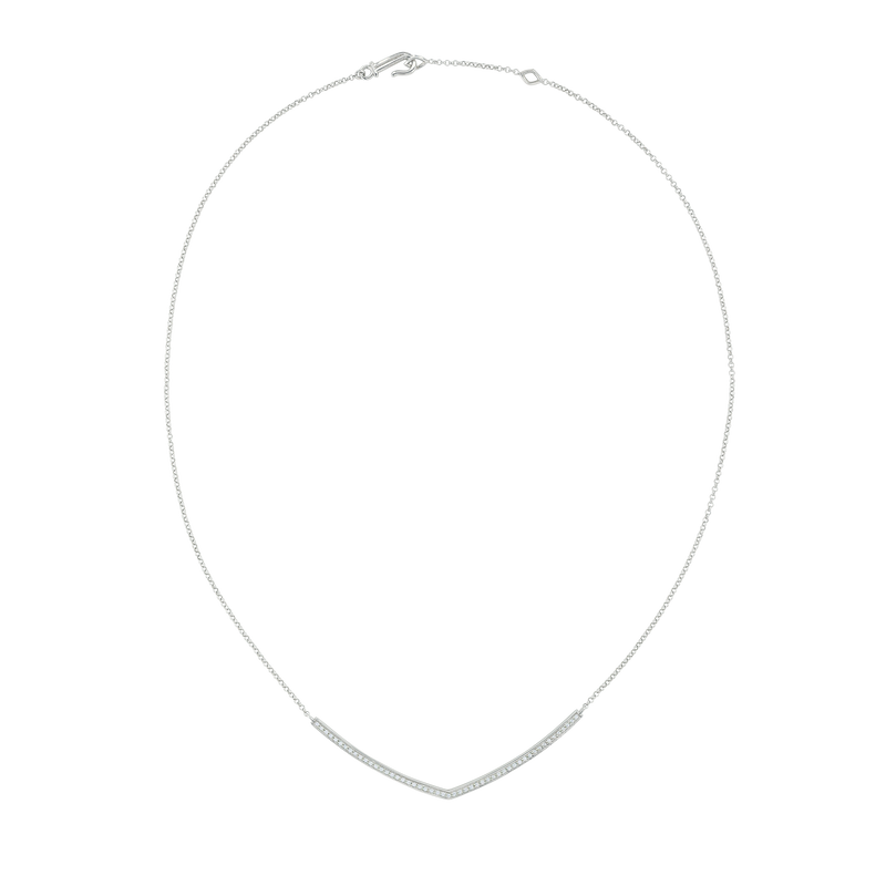 A flat-lay image of Juraster’s 9ct White Gold Diamond Adjustable Necklace, Voyager, crafted from Fairmined 9ct white gold and conflict-free diamonds, with an extended chain.