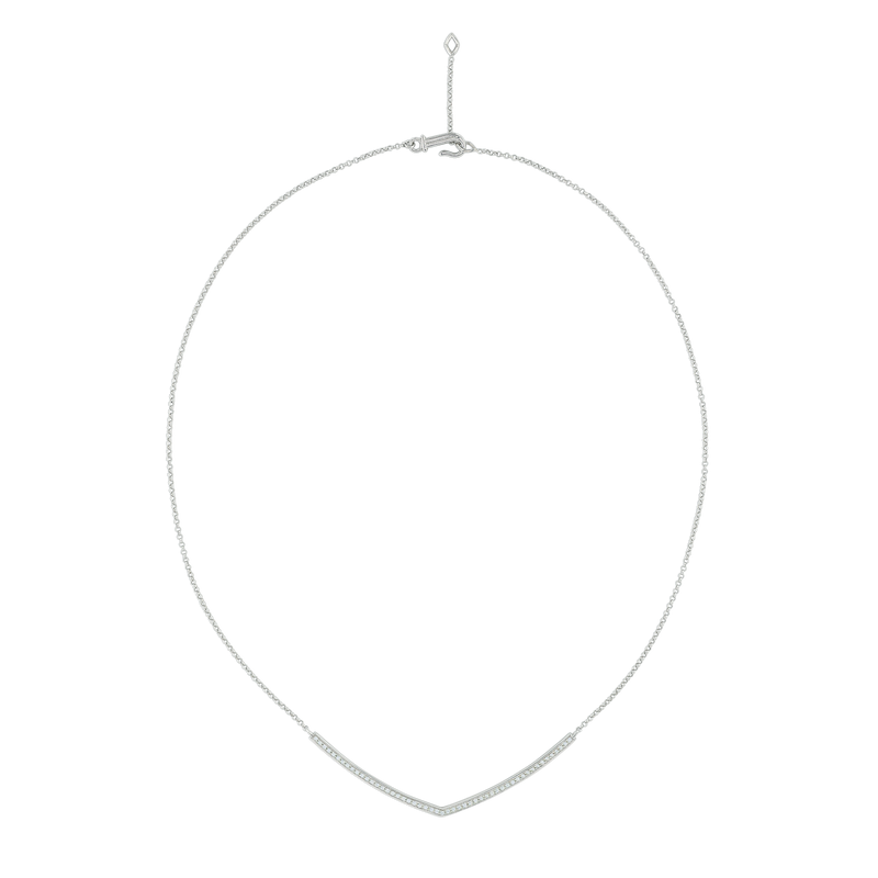 A flat-lay image of Juraster’s 9ct White Gold Diamond Adjustable Necklace, Voyager, crafted from Fairmined 9ct white gold and conflict-free diamonds, with a shorter chain.